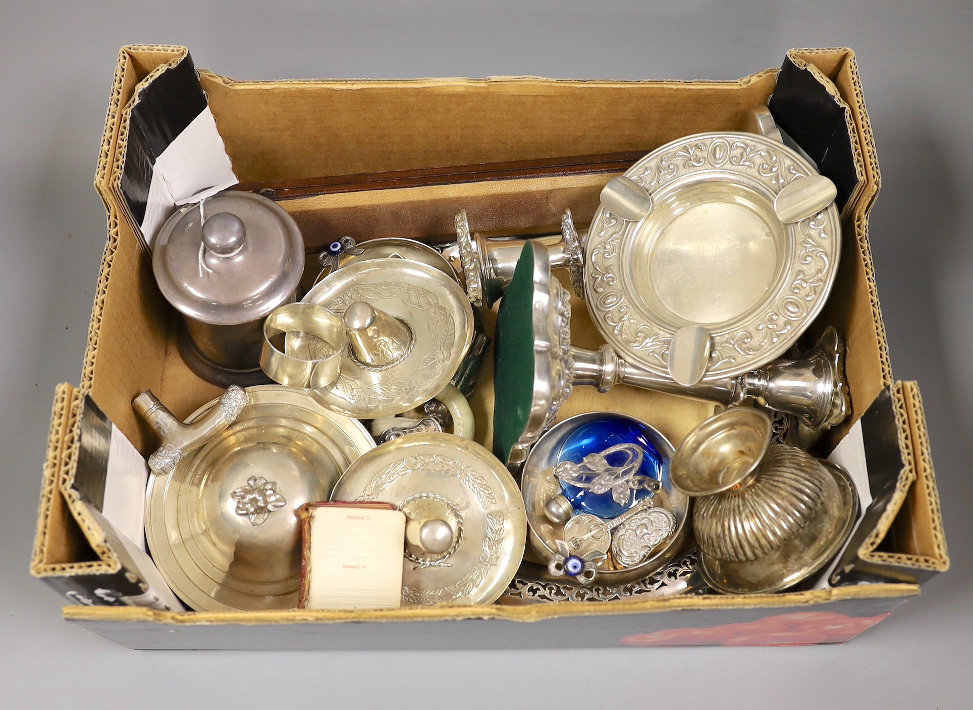 Sundry items of silver, white metal and plated items including a cased silver handled button hook, a silver mounted cylindrical jar and cover, two silver pill boxes including modern novelty banjo shape, a 900 standard di